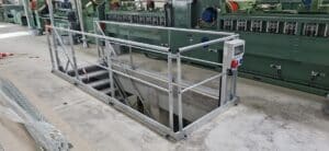 Garde-corps mécanosoudé et escalier sécurisant une trémie sur un site de production agricole